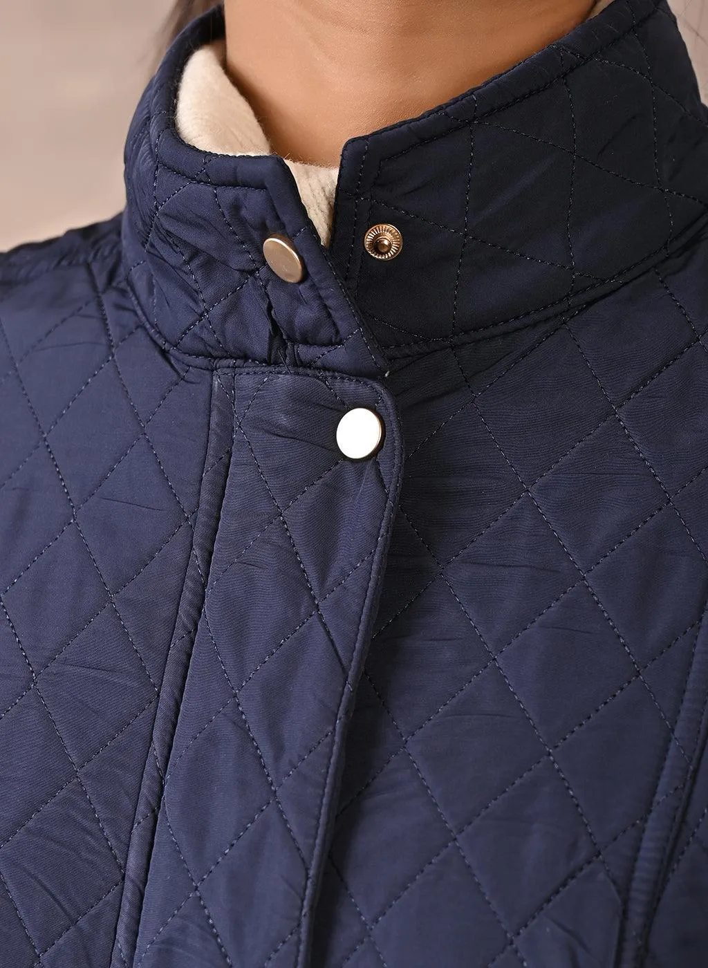 Navy Blue Solid Sleeveless Quilted Jacket  With Rivets Detail & Curved Hem